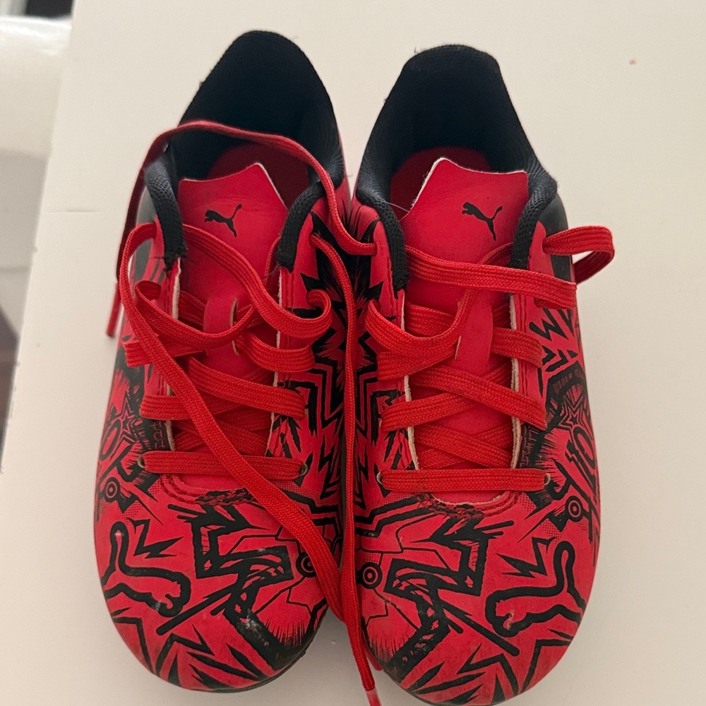 Puma Kids Red and Black cleats size 12